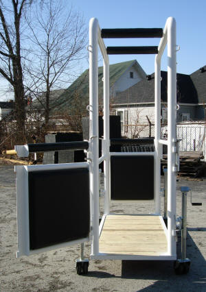 EquiGym Portable Stocks ready to move with wheels lowered and floor raised